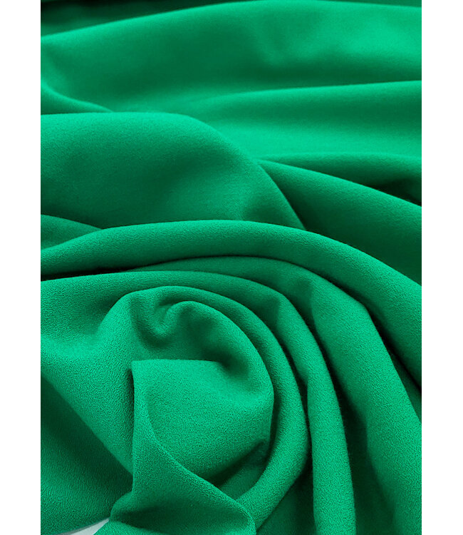 grasgroene crêpe - viscose mix met lichte stretch