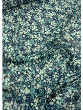 deadstock petrolkleurige bloemetjes op marineblauwe voile