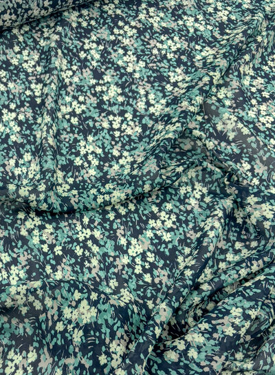 deadstock petrol colored flowers on navy blue voile