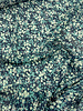 deadstock petrolkleurige bloemetjes op marineblauwe voile