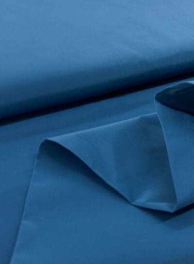 Madeline petrol - stof voor regenjassen