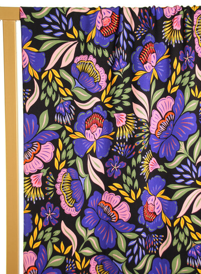 Atelier Jupe Black viscose with striking purple flowers