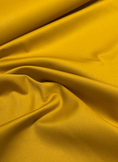 Madeline oker katoen gabardine - vast en stevig geweven - trenchcoat stof (niet waterproof)