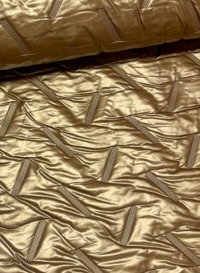 strikes- gold stepper - matelassed fabric puffer