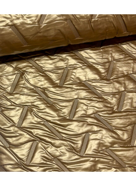 strikes- gold stepper - matelassed fabric puffer