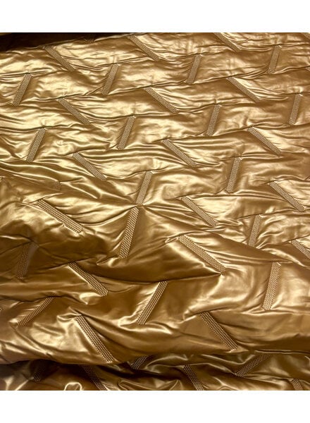 strikes- gold stepper - matelassed fabric puffer
