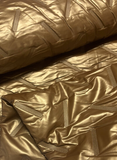 strikes- gold stepper - matelassed fabric puffer
