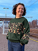Leo green sweater package