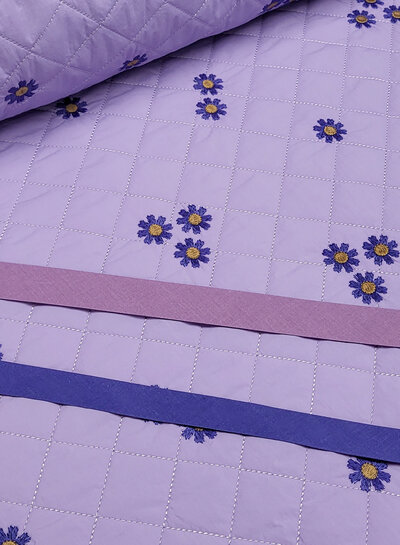 purple stepper with beautiful embroidery - quilted fabric