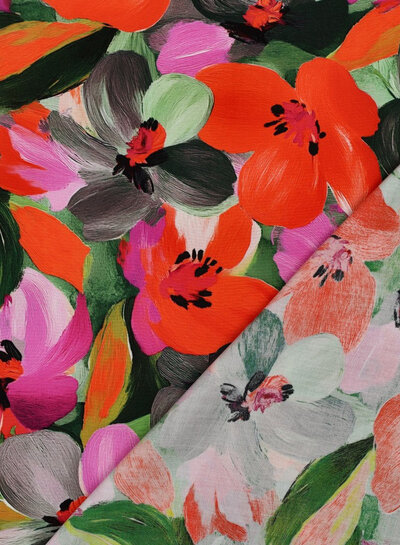 fuchsia oranje bloemen op groen - lenzing ecovero viscose