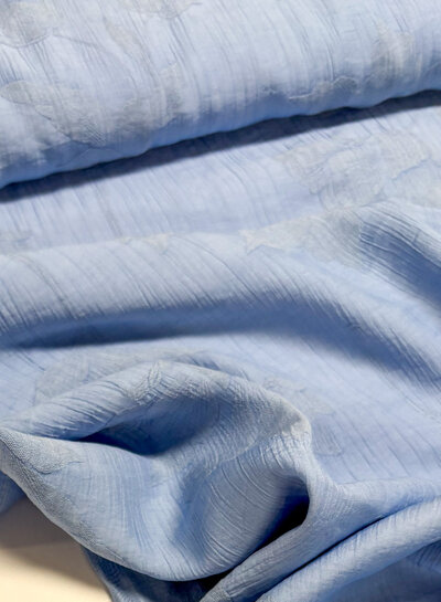 A la Ville blauw met ingeweven bloem - textuur viscose