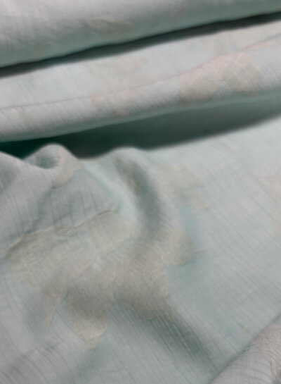 A la Ville mint met ingeweven bloem - textuur viscose