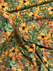 salmon-colored flowers on green - viscose