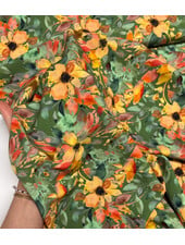salmon-colored flowers on green - viscose