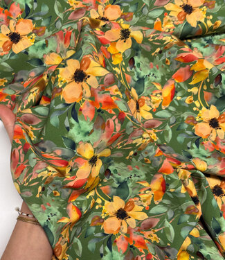 salmon-colored flowers on green - viscose