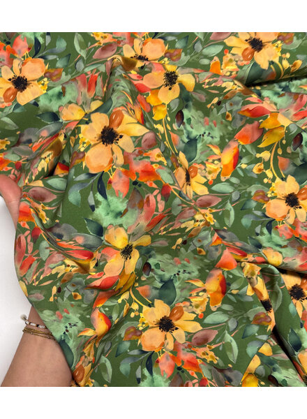 salmon-colored flowers on green - viscose