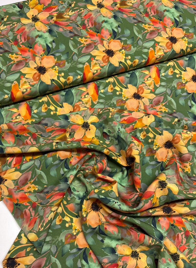 salmon-colored flowers on green - viscose