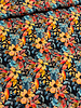zalmkleurige bloemetjes op zwart - viscose