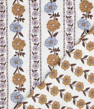 wit - gematelasseerde double gauze met bloemen