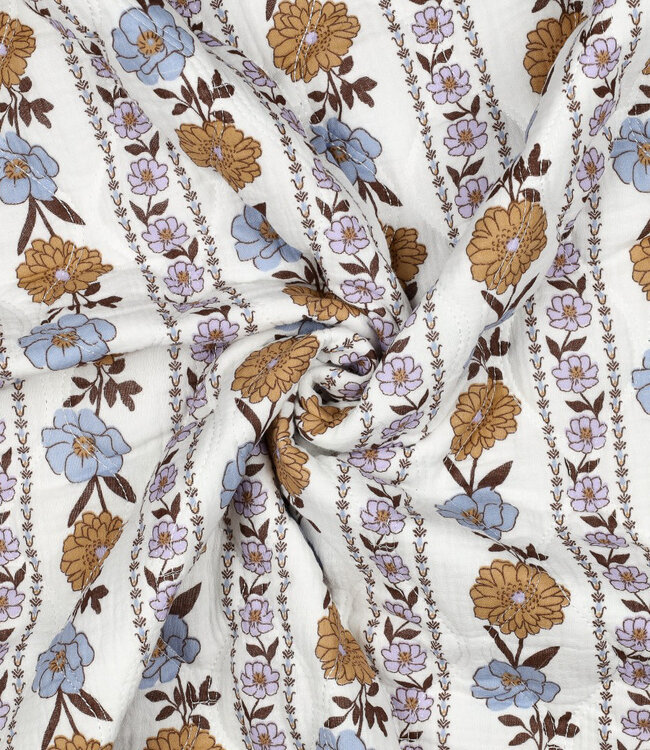 wit - gematelasseerde double gauze met bloemen