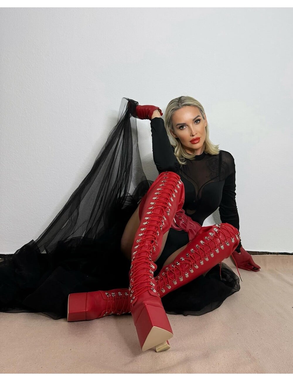 Sanctum Shoes Gabriela in the stunning Secretz red matte fetish thigh boots