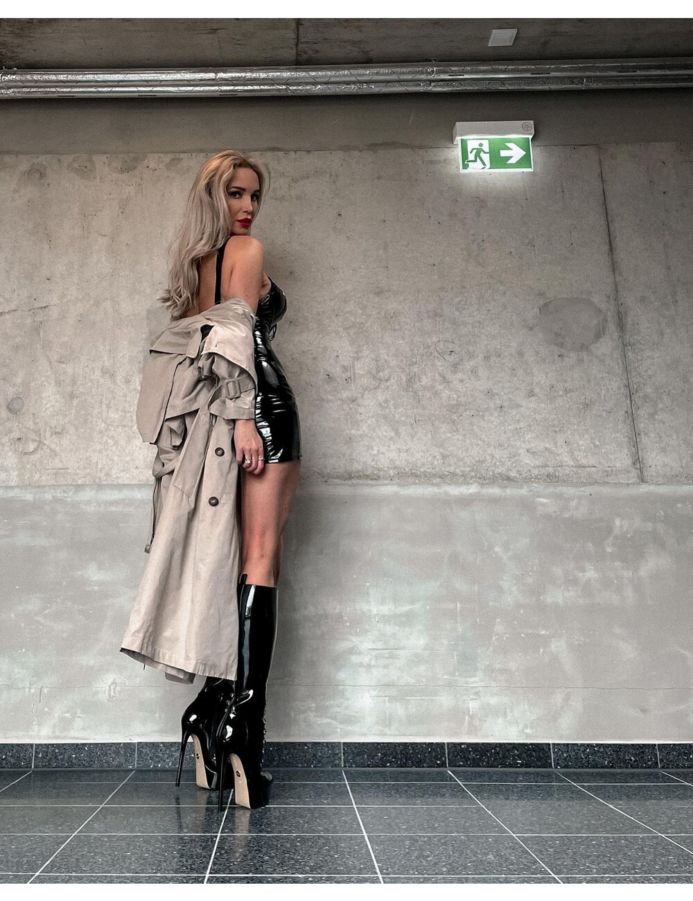 Sanctum Shoes Gabriela wearing our fetish lace-up knee boots in black shiny