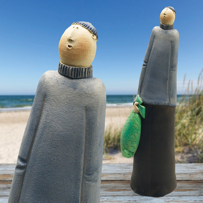 Haringman, met buit in de hand