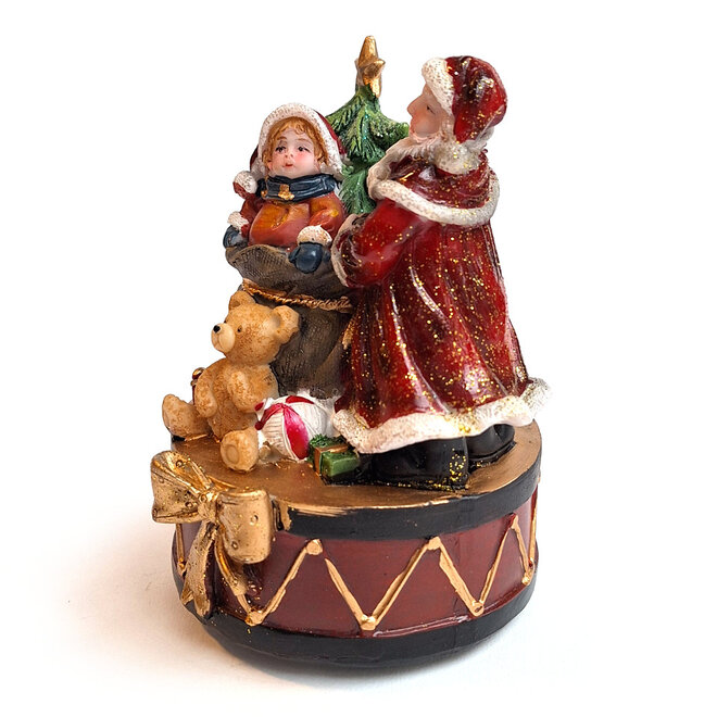 Kerstman met kind bij kadozak