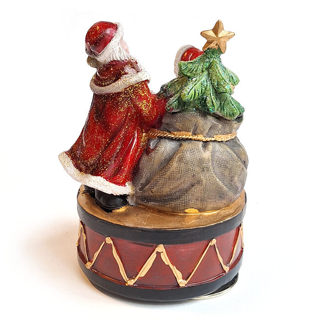 Kerstman met kind bij kadozak