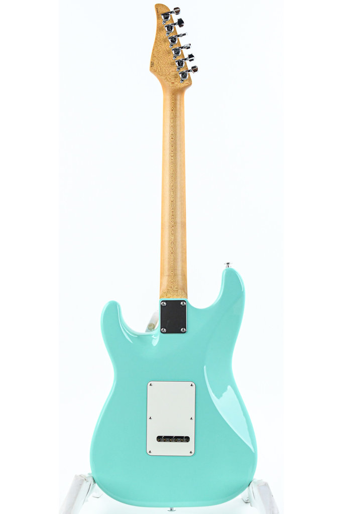 https://cdn.webshopapp.com/shops/179375/files/409983162/683x1024x2/suhr-suhr-classic-s-antique-surf-green-maple.jpg