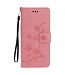 Roze Vlinders Bookcase Hoesje voor de iPhone 11