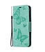 Turquoise Vlinder Bookcase Hoesje voor de iPhone 12 (Pro)