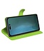 Groen Litchee Bookcase Hoesje voor de iPhone 14 Pro