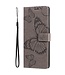 Grijs Vlinder Bookcase Hoesje voor de Samsung Galaxy A13 (5G) / A04s