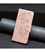 SoFetch Rosegoud Vlinders Bookcase Hoesje voor de iPhone 15 Pro