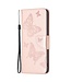 SoFetch Rosegoud Vlinders Bookcase Hoesje voor de iPhone 15 Pro