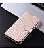 SoFetch Rozegoud Stippen Bookcase Hoesje met Polsbandje voor de Xiaomi 13