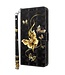 SoFetch  Gouden Vlinders Bookcase Hoesje met Polsbandje voor de Xiaomi 13