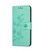 SoFetch Cyaan Bloemen Bookcase Hoesje voor de Samsung Galaxy S24