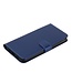 B40 Blauw Effen Bookcase Hoesje met Polsbandje voor de Samsung Galaxy S24 Ultra