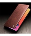 Qialino Bruin Elegant Bookcase Hoesje voor de iPhone 14 Pro Max