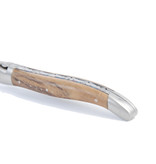 Laguiole en Aubrac 12cm loupe de noyer - platines guillochées - mat