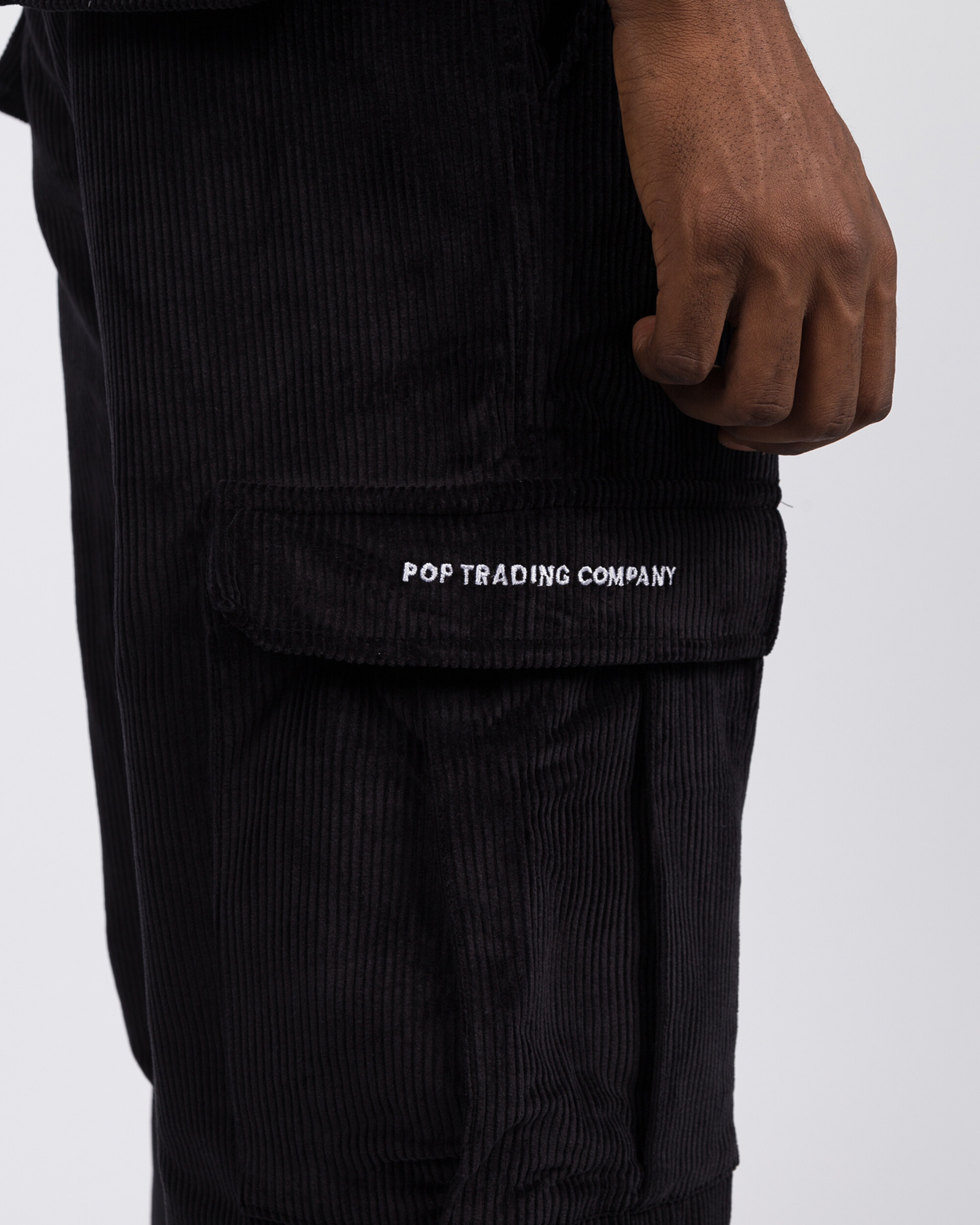 Pop Trading Co cord cargo pants black