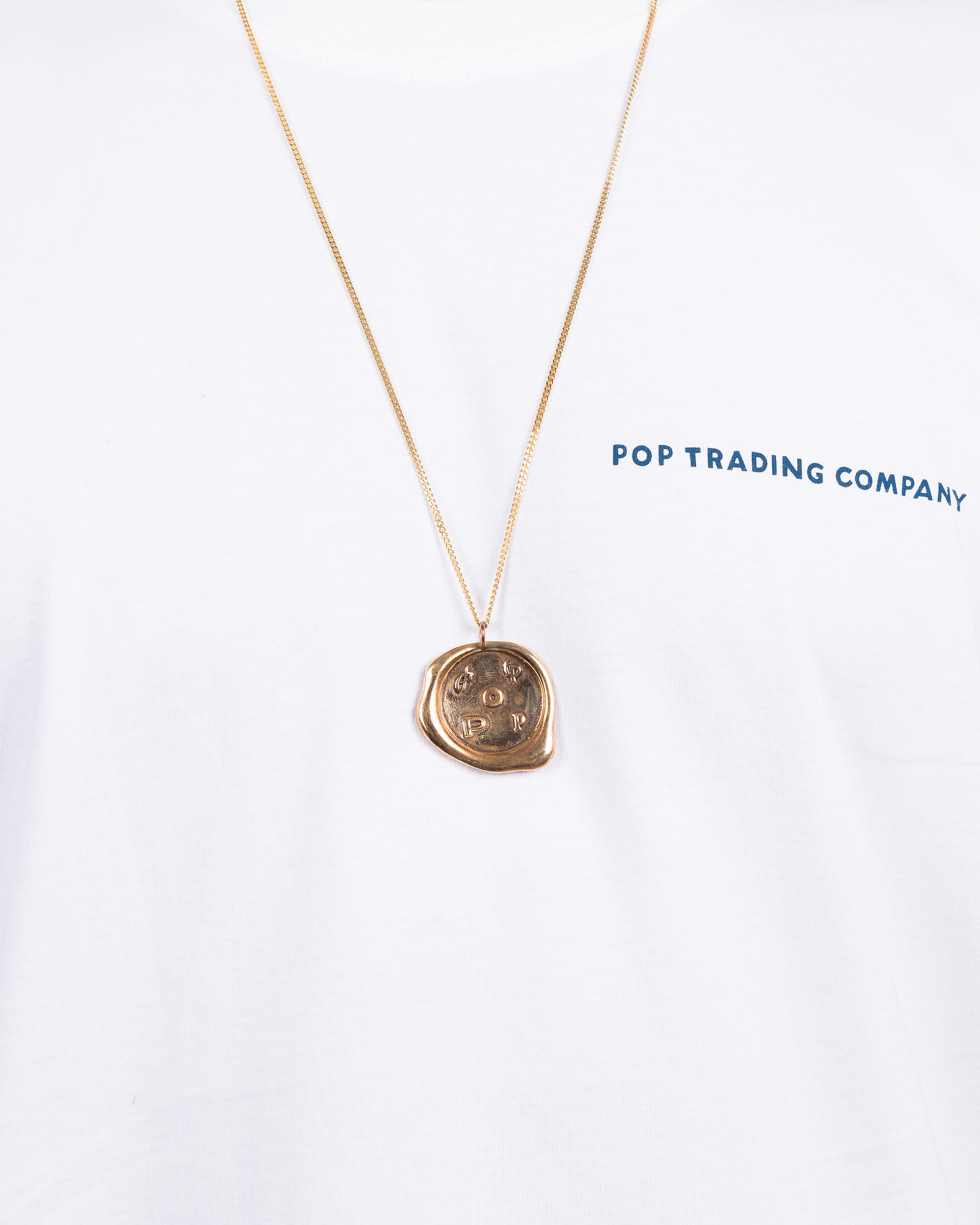 Pop Trading Co X parra bronze pendant