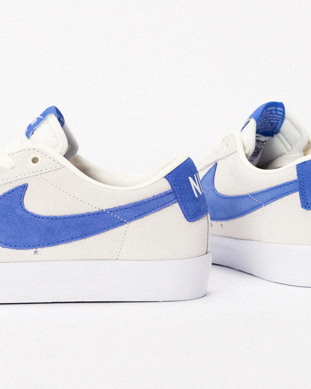 NIKE SB BLAZER LOW: PALE IVORY/PACIFIC BLUE