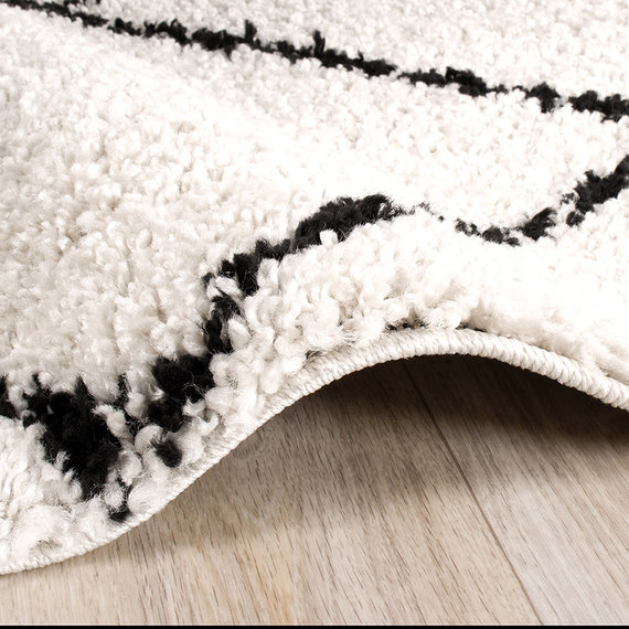 FRAAI Hoogpolig vloerkleed - Grand Lines Creme/Zwart