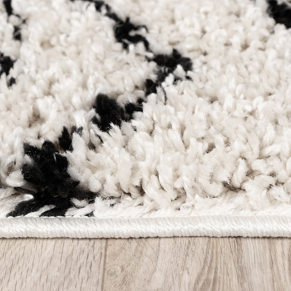 FRAAI Hoogpolig vloerkleed - Grand Outline Creme/Zwart