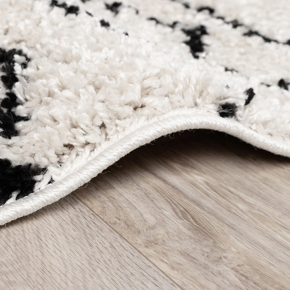 FRAAI Hoogpolig vloerkleed - Grand Outline Creme/Zwart