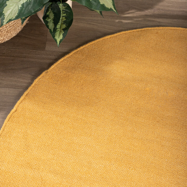 Rond wollen vloerkleed - Reno Okergeel