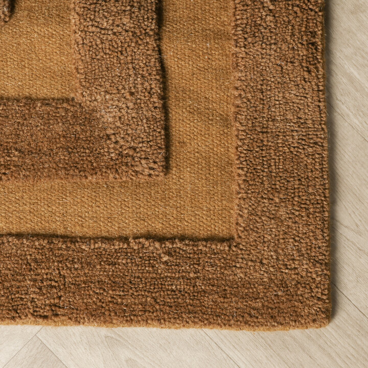 Wollen vloerkleed - Judith Border Bruin